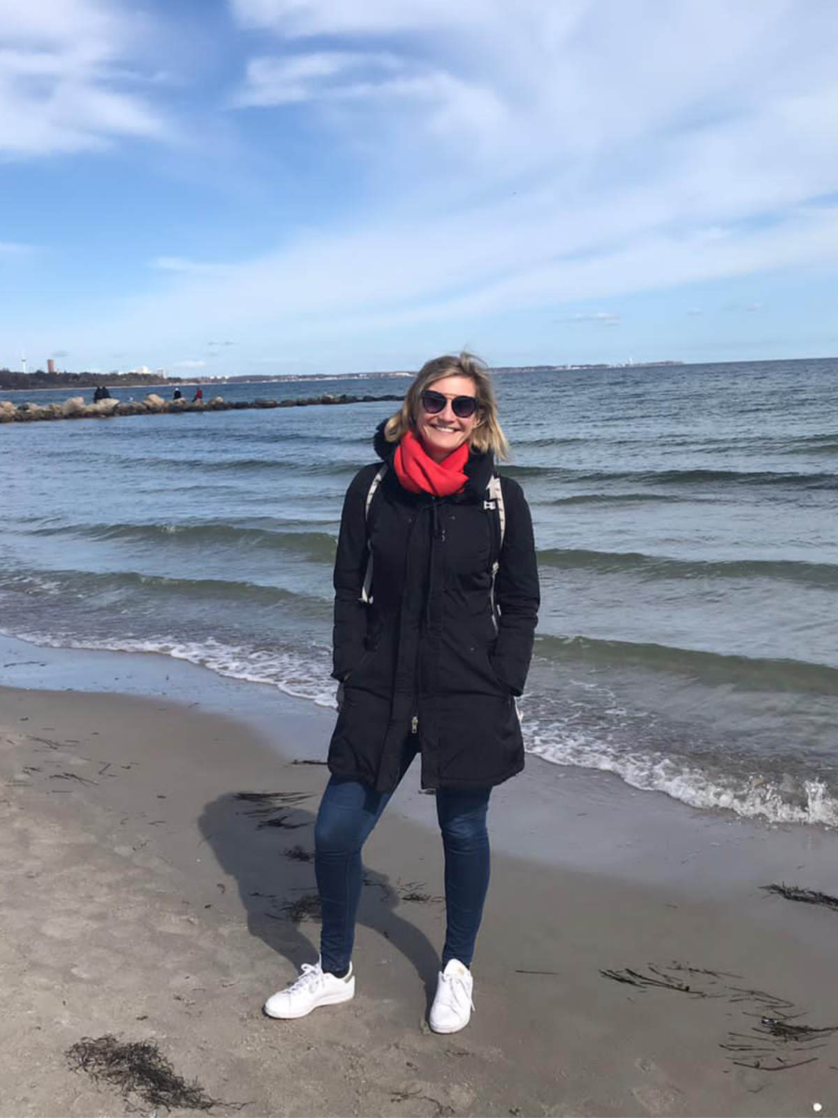 Sally Schulze relaxing by the sea